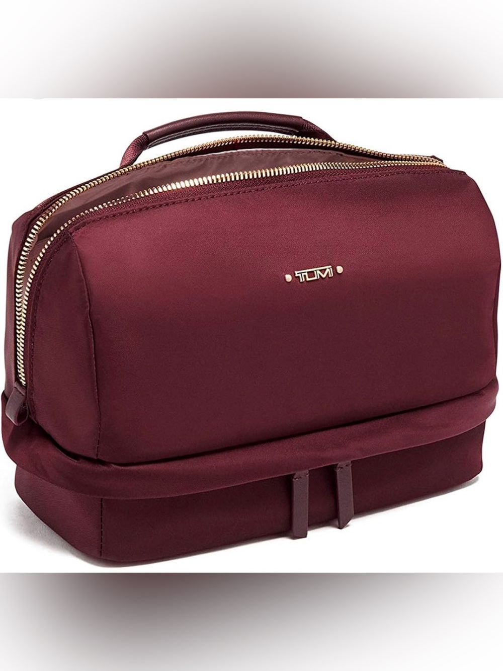 Stunning and rare Tumi Women's Burgundy Voyageur Bag with Gold Hardware